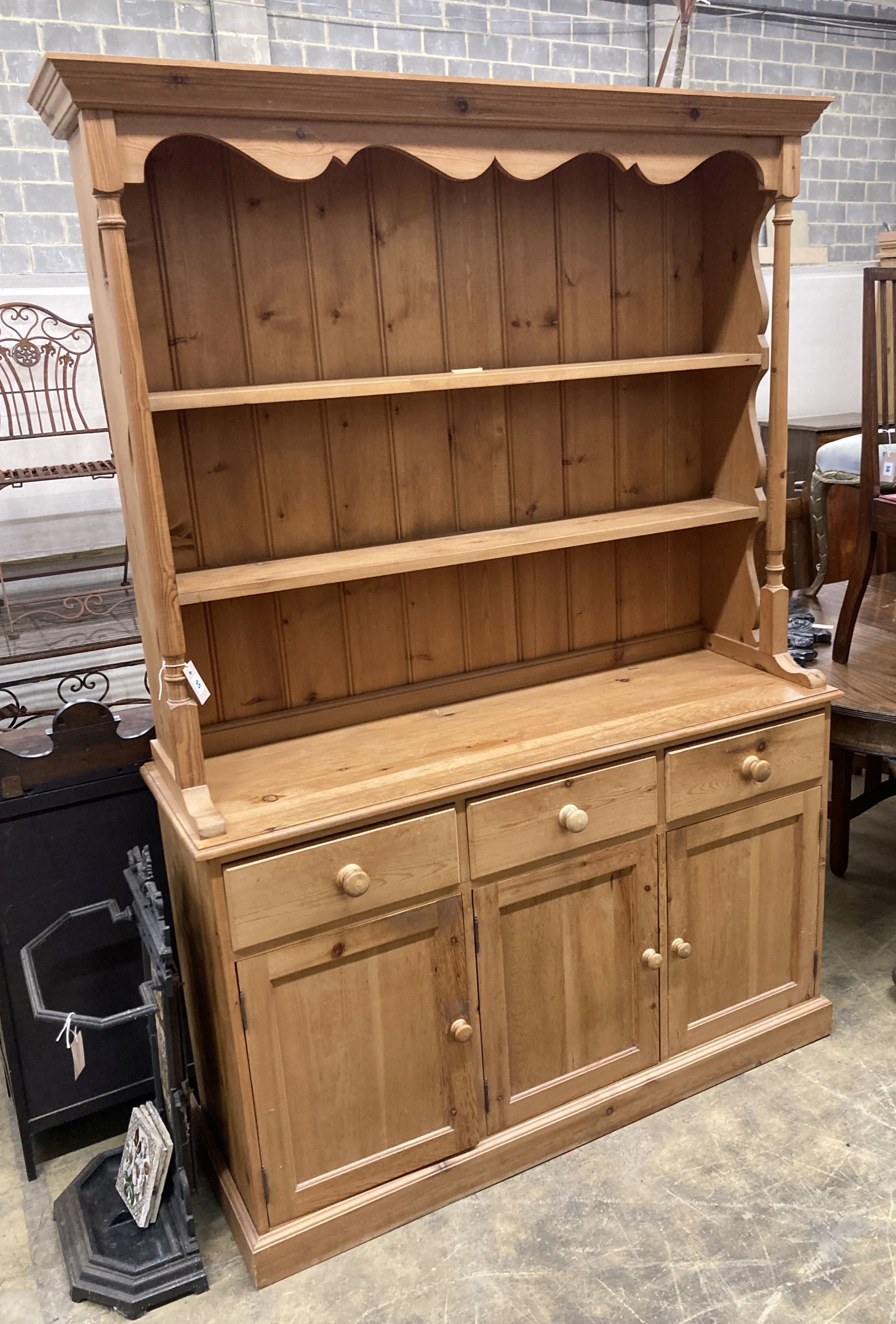 A Victorian style pine dresser, length 137cm, depth 45cm, height 200cm